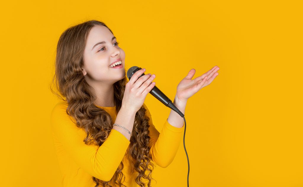 Youth girl enjoying singing